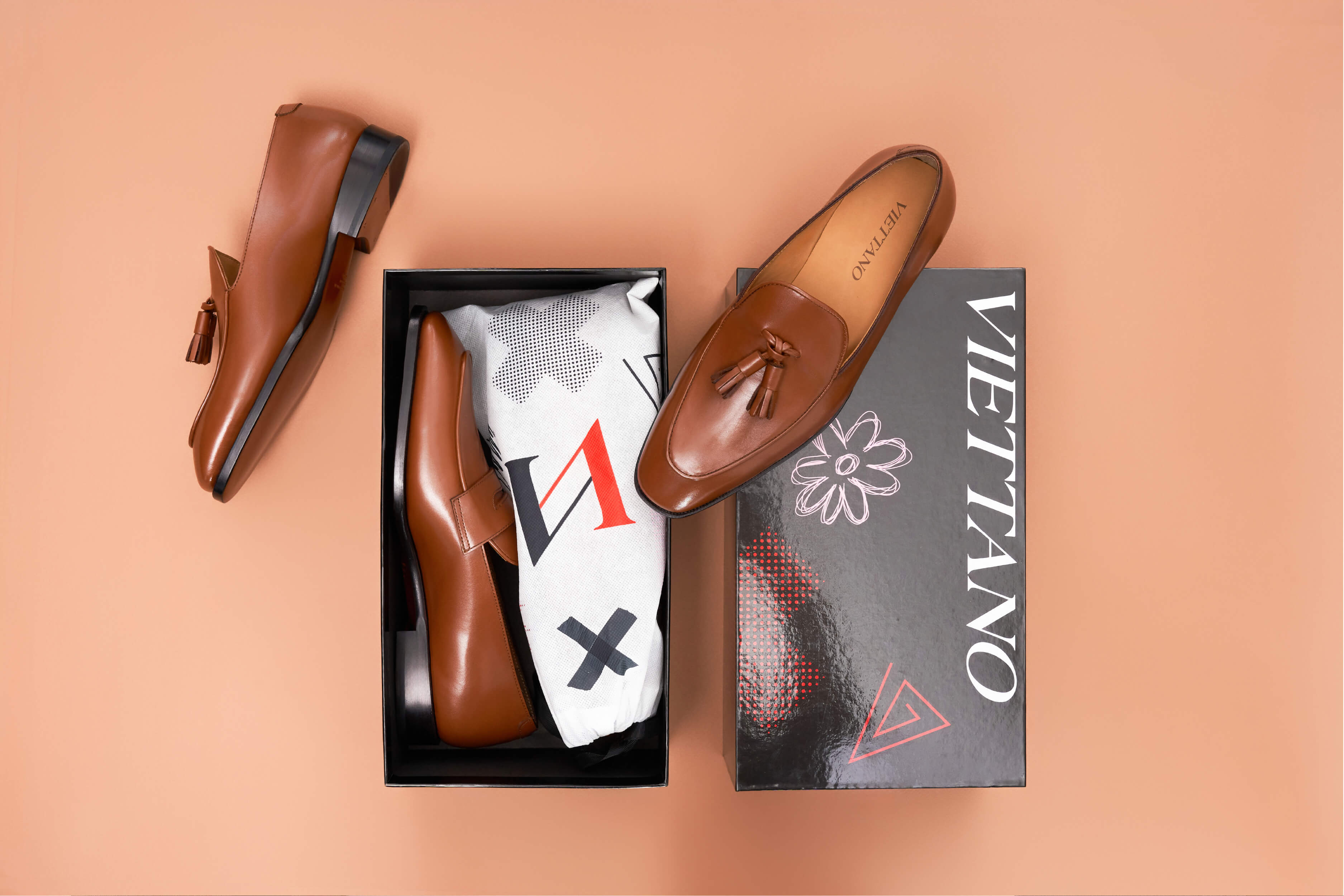A row of unworn dress shoes in a closet, several still in their boxes A row of unworn dress shoes in a closet, several still in their boxes