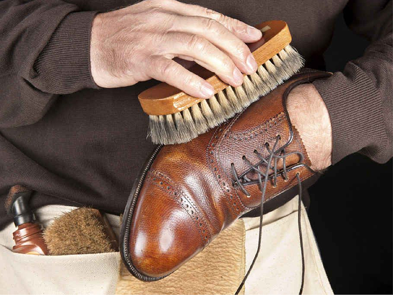 burnishing and finishing custom leather shoes